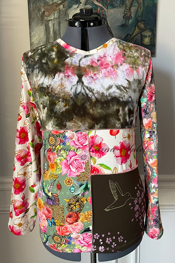 Colorful wearable art floral long sleeve patchwork t-shirt handmade with flower prints and hand dyed and a fabric hand printed with a hummingbird and cherry blossoms  – Matilde