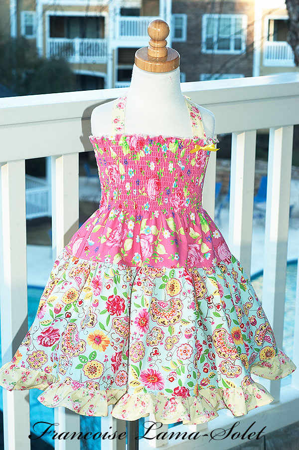 Girl's one of a kind ruffled tiered twirl dress handmade with pink, blue and yellow prints Candice