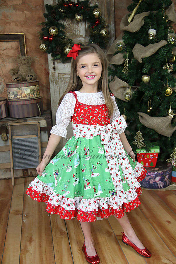 Girl's patchwork ruffled twirl dress with long belt made with red, green and white cotton prints Holiday Pixie