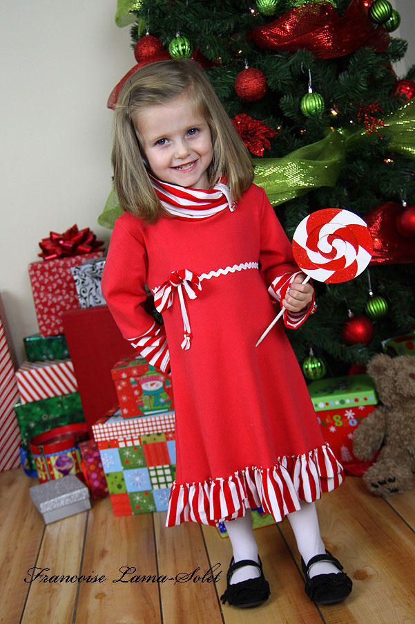 Girl's long sleeve red a-line ruffled jersey dress made with a red and white striped candy cane jersey Sassy Mint