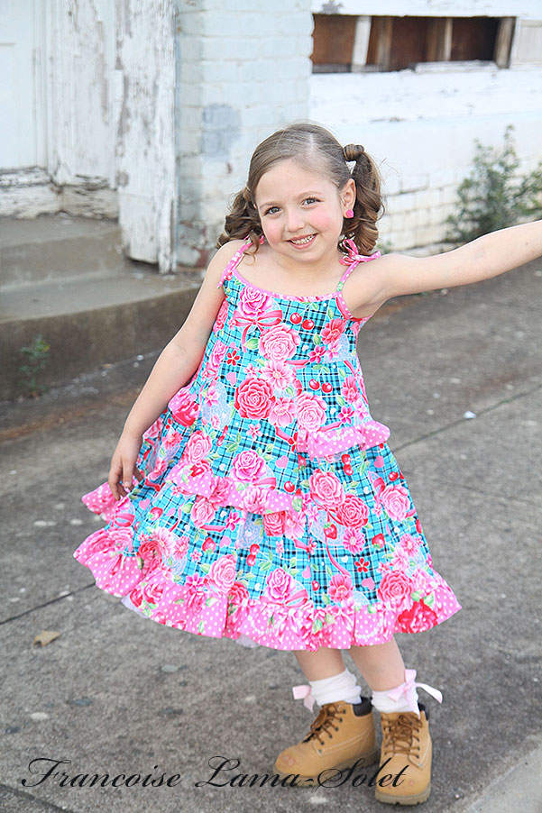 Girl's ruffled twirl dress with shoulder straps handmade with a colorful blue pink plaid print Scottish Roses