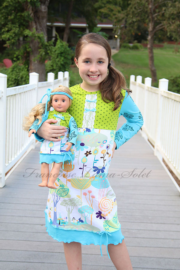 Girl's hand printed a-line patchwork jersey dress in the shades white, turquoise and lime with doll dress Woodland