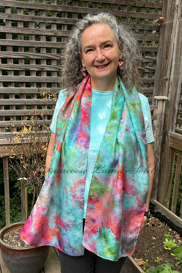 Women's wearable art ice dyed long silk scarf hand dyed with different shades of pink, peach, purple, turquoise and green - Blooms in the Lagoon