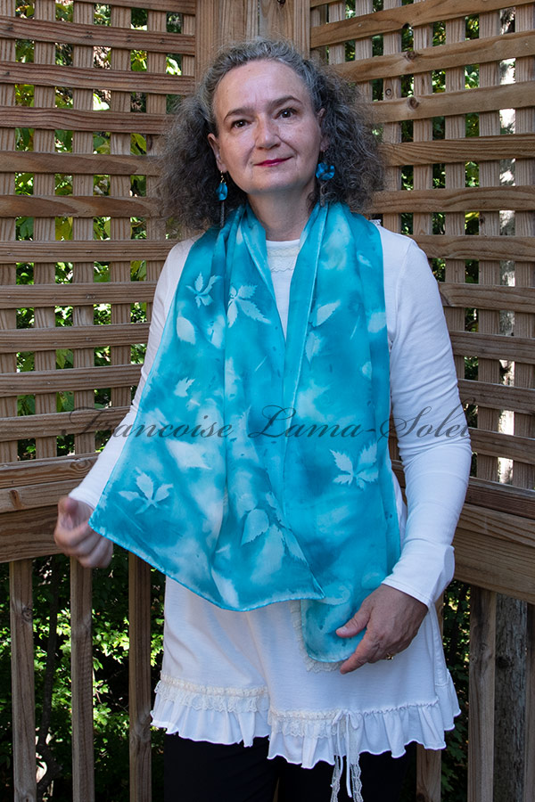 Women's wearable art lightweight summer silk scarf hand painted in different shades of aqua and turquoise and sun printed with leaves - Lagoon