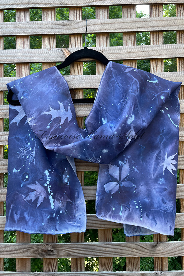 Women's wearable art seasonless art silk scarf hand painted in different shades of dark blue and baby blue and sun printed with natural leaves - Midnight
