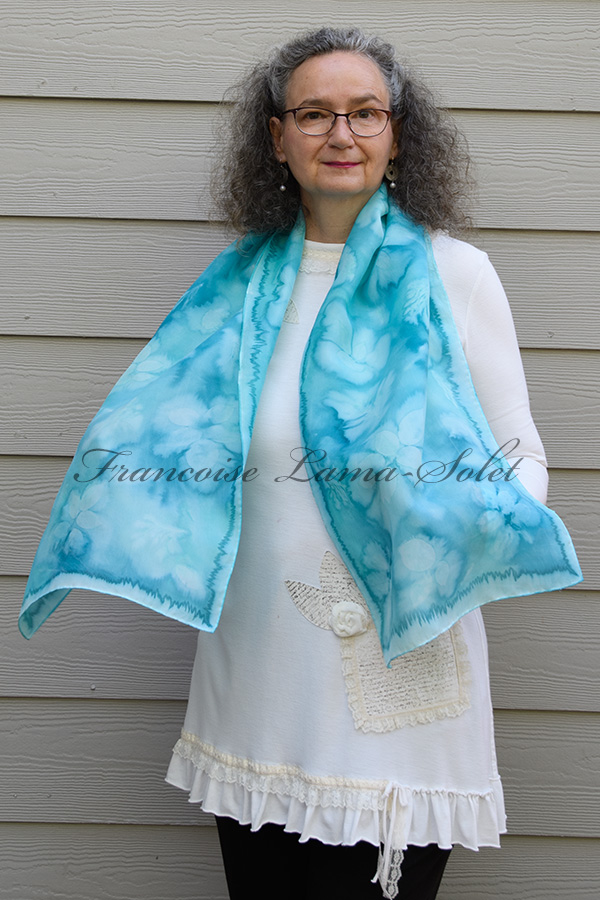 Women's wearable art lightweight summer silk scarf hand painted in different shades of aqua and turquoise and sun printed with leaves - Tropical Paradise